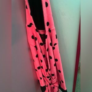 Me, pink and black spotted bathroom with sequins ears on the top part